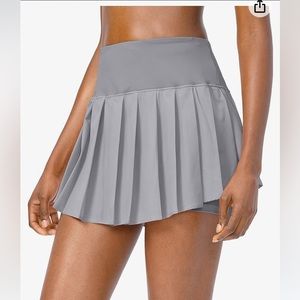 NWT SANTINY army green pleated tennis skirt with short liner size M.